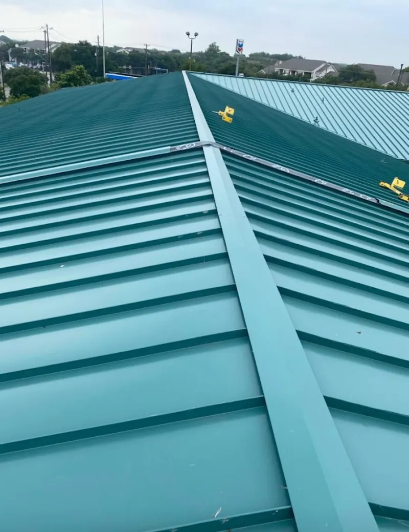 Green commercial metal roof ridge and valley for Metal Roof Repair in Pelham Manor