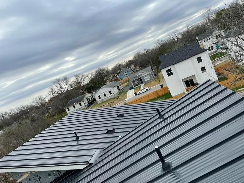 Standing seam metal roof panels with vents for Skylight Repair in Pelham Manor